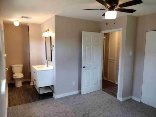 primary bedroom with restroom